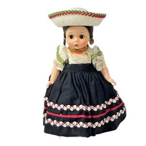 Madame Alexander bent knee restrung 8" Mexico doll with stand.